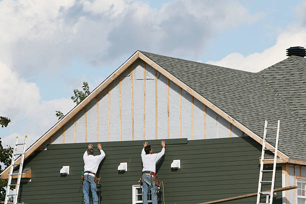 Professional Emergency Siding Repair technician working in Milford Center, OH